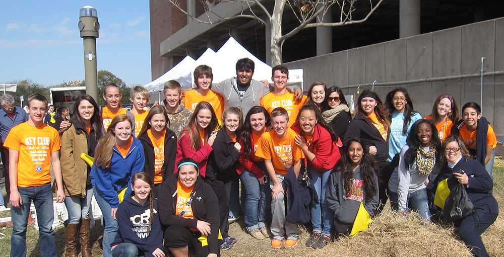 The Key Club poses at the Urban Harvest Tree Sale.