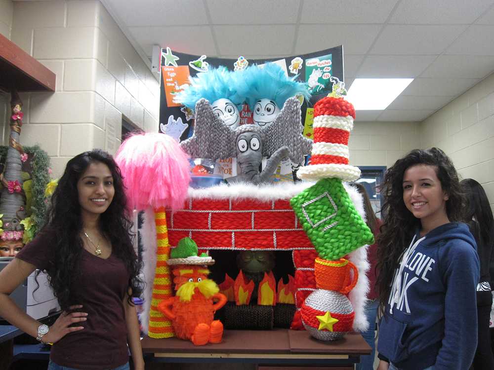 Aziz and Villa-Gomez pose next to their award-winning creation.