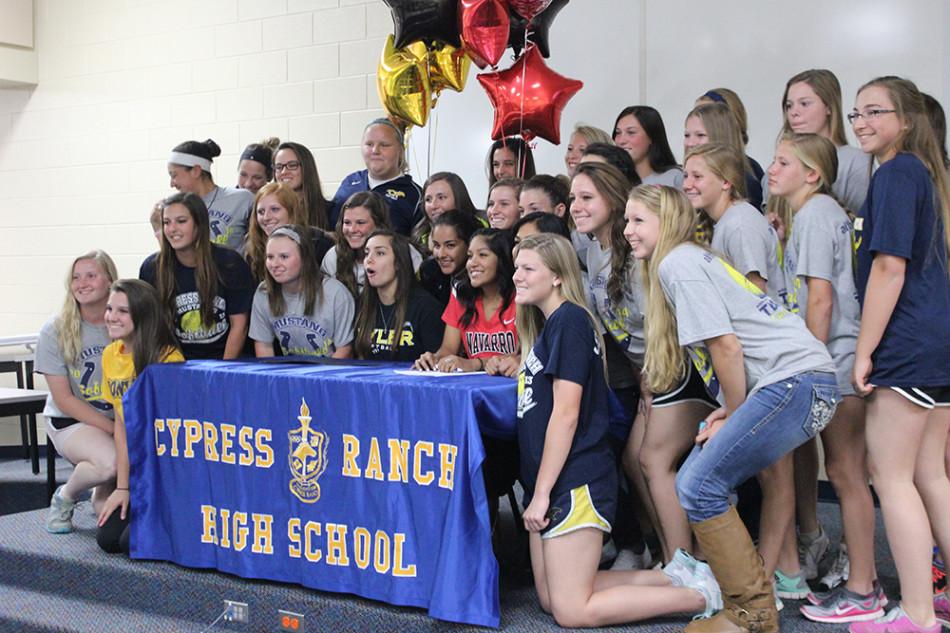 Seniors Miranda Bazan and Autumn Holloway sign on to play college softball.