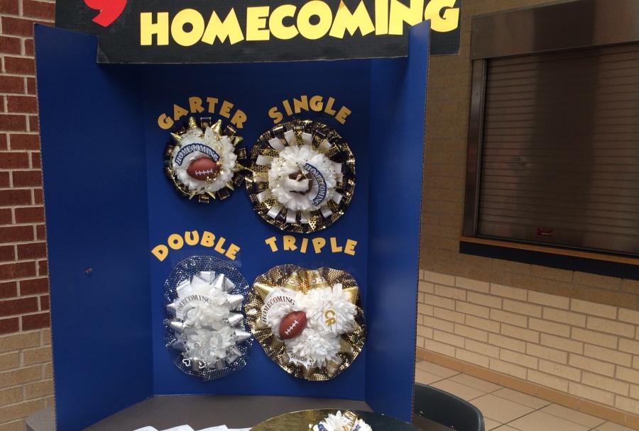 A booth is set up outside the AP's office to sell mums to students. 