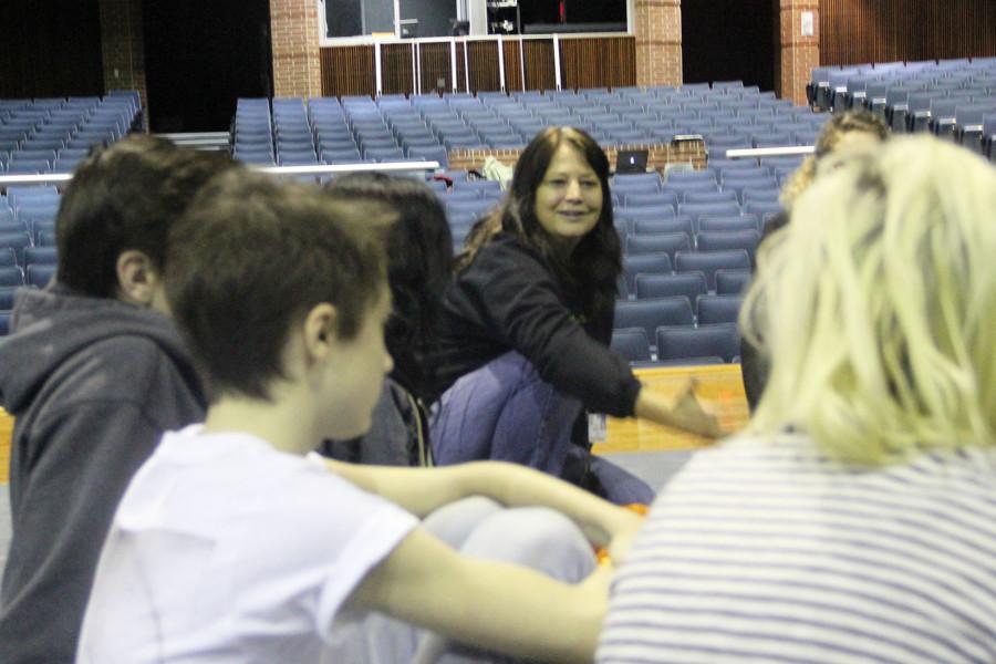 Coach Cheryl Bradford talks to her film class.