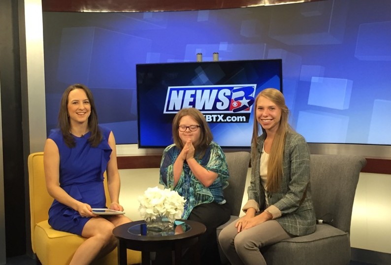 Norris (middle) discusses the Buddy Walk on KBTX.