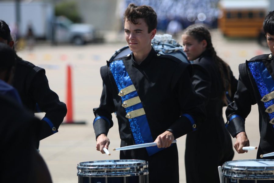 Philip Whaley playing the drums at a Band competition.