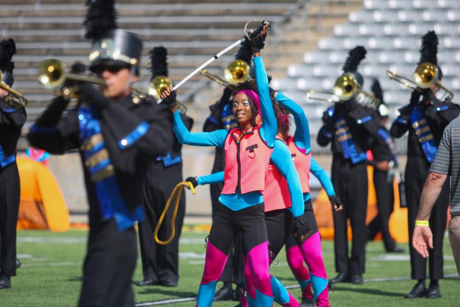 The Cypress Ranch Color Guard performing alongside the Cypress Ranch Band