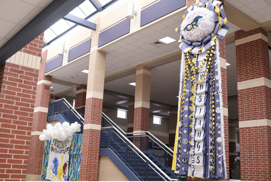 Cypress Ranch students create a large mum to showcase during Homecoming Week.