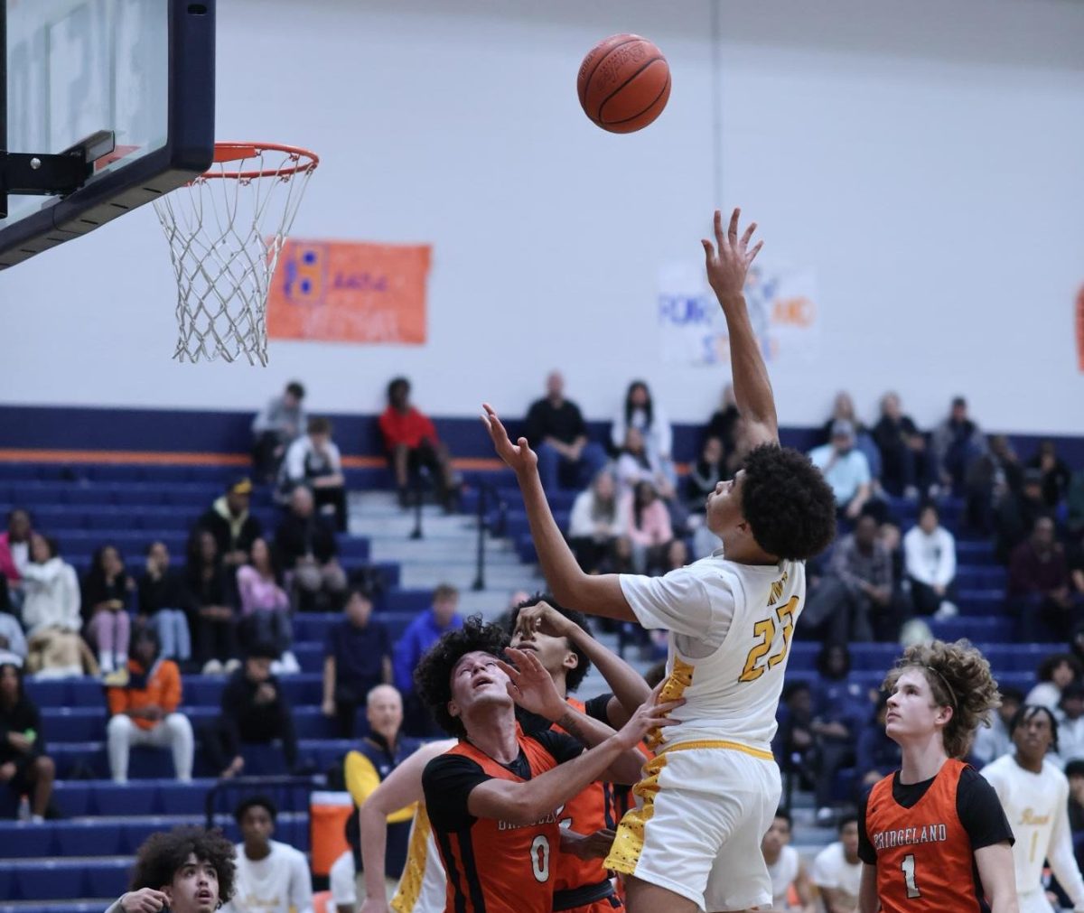 Varsity boys basketball topples Bridgeland