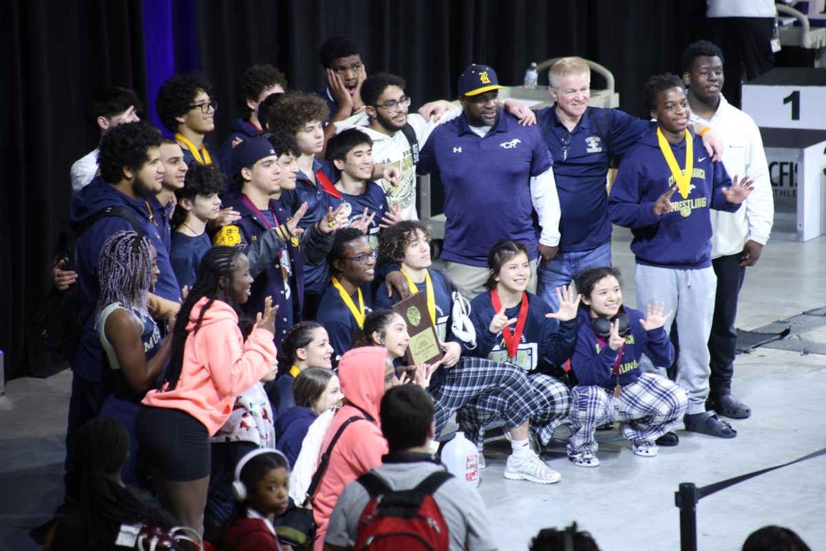 The Cypress Ranch wrestling team poses after their wins at the district meet on Jan. 31.