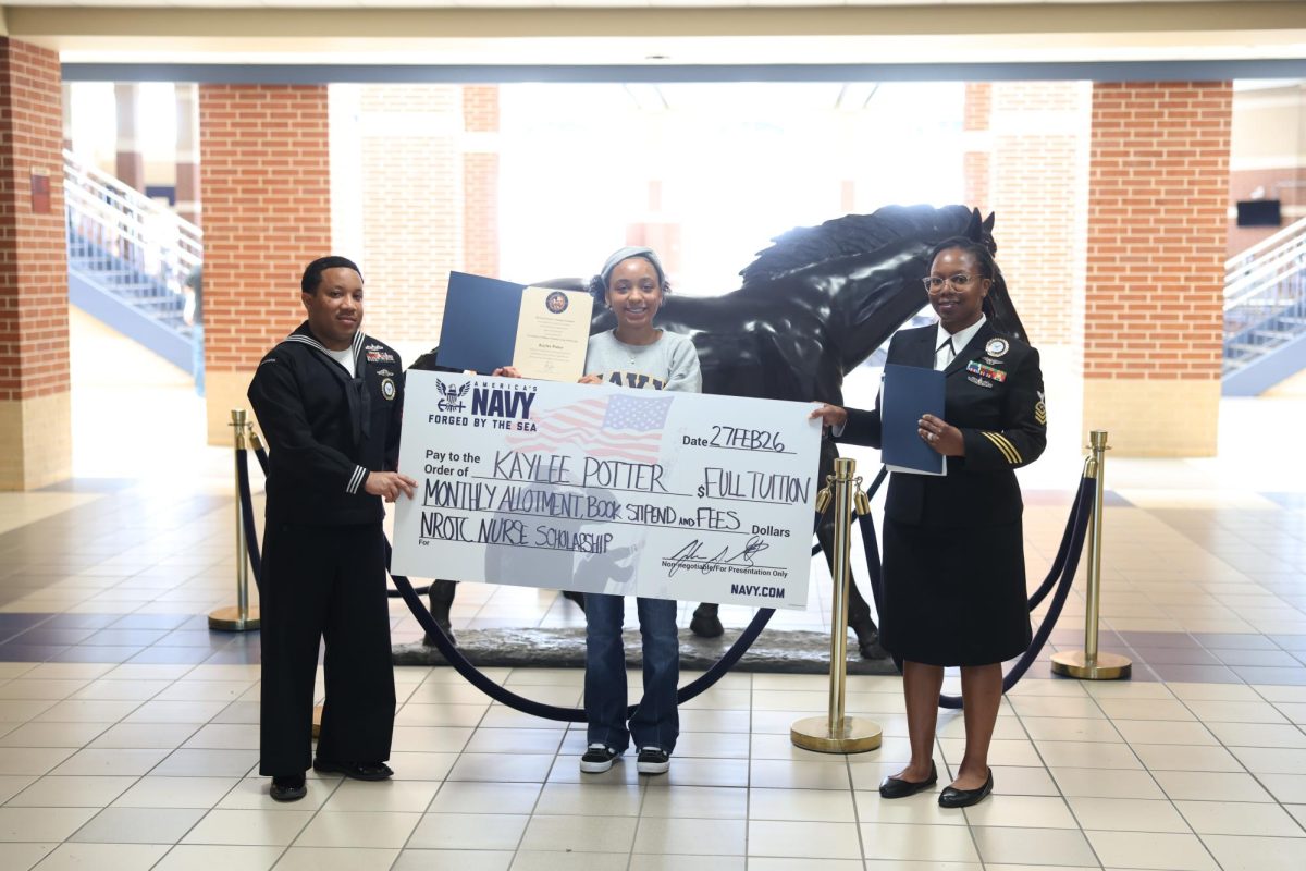 Senior Kaylee Potter receives the NROTC Scholarship Feb. 27 to support her pursuit of becoming a nurse and serving in the Navy.